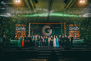 Golden Grab Merchants of the Year Juliet Chen Serenitea Gerby Estrella JTs Manukan Grille and Ryan Tan Oh Mango with Grab Philippines leaders led by Managing Director Ronald Roda Golden Grab Awards 2025 Honors PH’s Top Merchant Partners