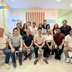 PR Photo 1 A group photo of RuralNet Inc. with Founder CEO Justin Arcenas 4th from left seated RuralNet Surpasses ₱400 Million in Insurance Payouts, Expands Into Climate Protection Solutions