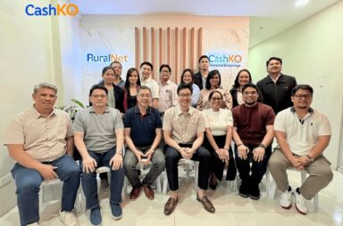 PR Photo 1 A group photo of RuralNet Inc. with Founder CEO Justin Arcenas 4th from left seated RuralNet Surpasses ₱400 Million in Insurance Payouts, Expands Into Climate Protection Solutions