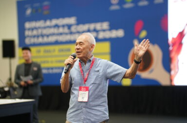 Victor Mah President of the Singapore Coffee Association delivering his address at the finals of the Singapore National Coffee Championship 2026 Singapore crowns four national coffee champions for World Coffee Championships 2027