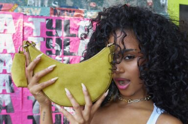 Tyla carries the Duo Mini shoulder bag in Laurel Leaf Tyla Named Kate Spade New York’s New Global Brand Ambassador